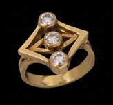 טבעת זהב 14K וכסף, חישוק משובץ יהלום מרכזי במשקל של כ- 0.50 ct ויהלומים מסביב. $ 1,400 1,800 588.
