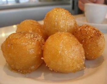 Zvingous (Honey Puffs) (פחזניות מתוקות ( זווינגוס These Sephardic Hanukkah treats a type of Bimuelos.