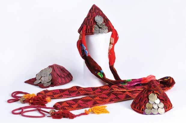 210 210. Three Embroidered Caps with Maria Theresa Thalers Southern Hebron Hills 1. Embroidered cap. Southern Hebron Hills, Eretz Israel, early 20 th century. Cotton, embroidery threads and coins.