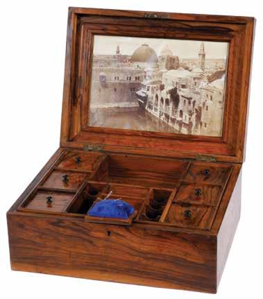 In the inner section, are small compartments for storing the sewing supplies and a velvet pillow. The upper tray is removable and has additional storing under it.