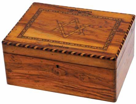 239 239. Olive Wood Box Decorated with a Star of David Eretz Israel, The 19 th Century Olive wood box, for storing sewing supplies. Eretz Israel, end of the 19 th century.