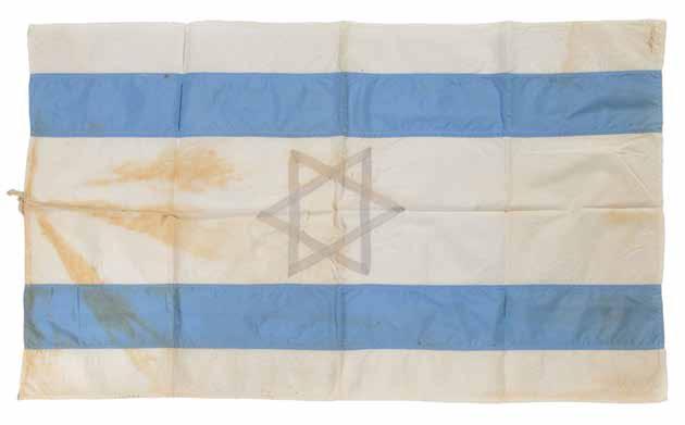 Israel [1948]. Fabric; sewn. In the center of the flag appears a Star of David made of white ribbons with two light blue stripes on both sides.