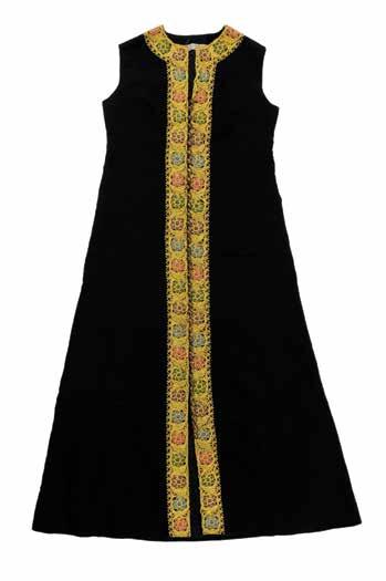 Israel. Mid 1970s. Bethlehem style embroidery with golden and colorful threads on black cotton, with silvery buttons. Embroidery design: Marie-Therese Kagan. Size 42.