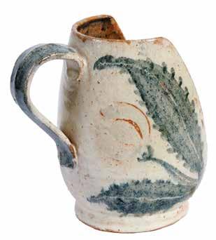 282 283 282. Candlestick Kad VaSefel Workshop Candlestick in the shape of a jug with floral decorations. Created by Kad VaSefel, Rishon LeZion.