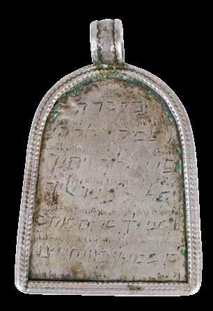 Pendent Amulet for Protection of Babies Persia Pendent amulet for protection of babies from Persia shaped as a house with Lilith bound in the center. Persia, [19 th century?].