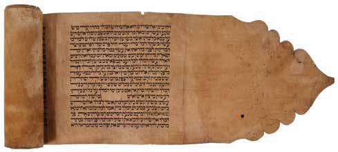 43 44 44. Esther Scroll Flower Serifs Esther scroll, scrolled on a carved wooden handle. Sephardic Vellish script, 20 th century. Wooden handle, ink on parchment.