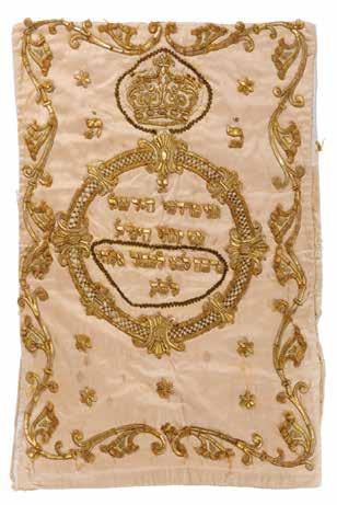 In the center the dedication inscription in Hebrew informing us that Mordechai Hirshel and his wife Hindel donated this Torah mantle. Seven stars are embroidered around.