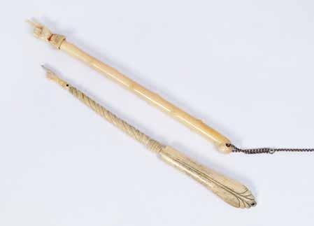 פתיחה: $250 74. Ivory Torah Pointer Europe Ivory Torah pointer. Europe, [late 19 th or early 20 th cent.]. The handle s upper part is flat and carved in a stylized vegetal decoration.