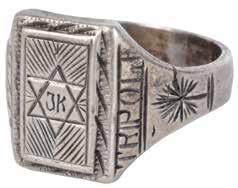 102. Glass Bottle made in the Factory of Joseph Schatz Budapest Glass bottle with an inscription and a Star of David made by Joseph Schatz s factory. Budapest, [early 20 th cent.]. Brown glass.