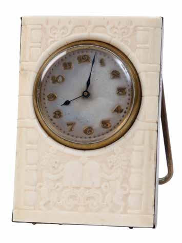 108. Table Clock Ivory Plaque Decorated with Tablets of the Law England Table clock. Birmingham, England, 1920. Silver frame (marked); brass, carved ivory.