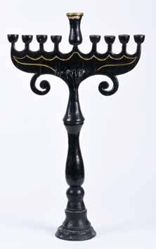 128 127 128. Hanukkah Lamp Russia, Early 20 th Century Hanukkah lamp, Russia, 1908-1917. Silver (marked). The lamp has a cast base with legs, upon which sit small cups.