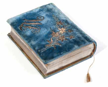 Blue elegant velvet binding, silver embroidery of flower patterns and monogram of owner with letters JM. 32; 87; 256; IV pages, [1], photograph plate. 16cm. Very good condition.