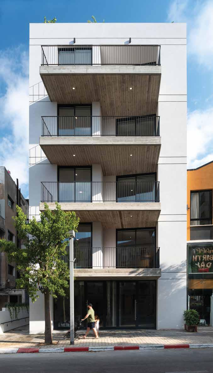 בניין מגורים רחוב מונטיפיורי, תל אביב למעלה: מעבר הכניסה לבניין. למטה: חיבור מסוגנן בין חומרי הגמר מבטא פירוט מוקפד.