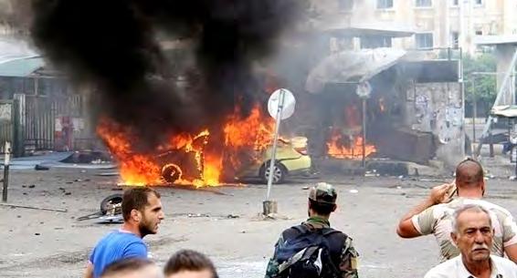 ת ק פ ו, א ל ש ר י ח י; ט ר ב א; 7 מכונית העולה באש באזור השוק בעיר אלסוידאא ' (ח' טוה, 25 ביולי ( 2018.